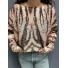 Top pull oversize imprimé leopards stylisés