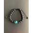 Bracelet -Tête de mort turquoise et Perles de lave sur cordon